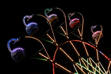 Low Angle View of illuminated Carousel in Darkness