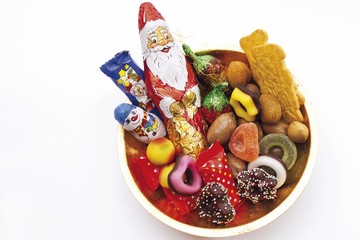 Alms plate covered in Christmas sweets