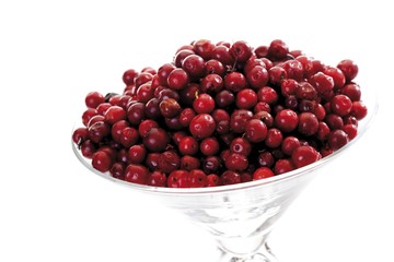 Lingonberries or Cowberries (Vaccinium vitis-idaea) in a glass