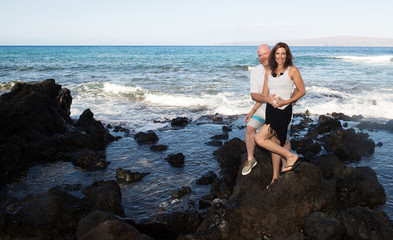 Happy middle aged couple on Hawaiian vacation