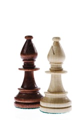 Opponents: two bishop chess pieces