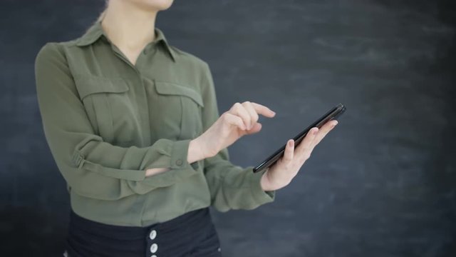  Unrecognizable Woman Using Tablet On Blank Chalkboard Background