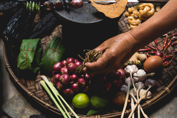 Lanna food Hand show lemon Eggs and onion  Thai food Northern Thai Cuisine Rustic kitchen Old hand Hands are cooking 