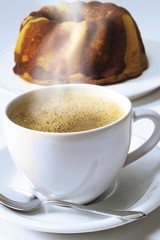 Cup of coffee and marble cake