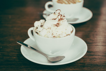 Hot marshmallow chocolate in white cup
