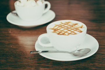 Hot caramel coffee cup latte