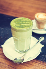 Hot matcha green tea latte cup