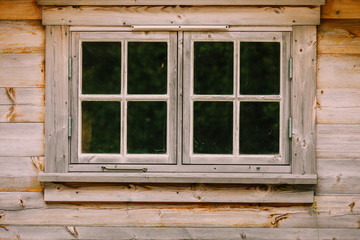 Fototapeta na wymiar Old vintage dark wooden window, rural design concept.