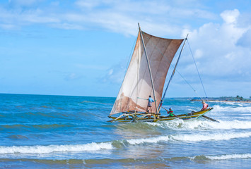 Fototapeta premium Sri Lankan traditional fishing catamarans in Negombo, Sri Lanka. Negombo is known for its centuries old fishing industry & long sandy beaches