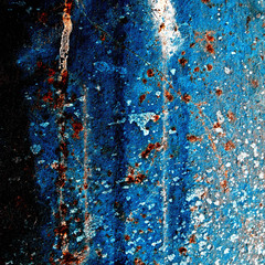 Texture of old metal with rust covered with paint blue