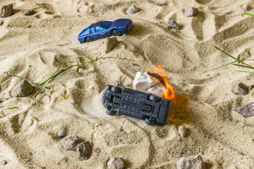 Fototapeta na wymiar Racing cars compete in the sand.
