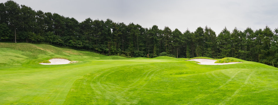 Golf Course where the turf is beautiful and green in Hokkaido, Japan. Golf is a sport to play on the turf	