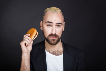 man eating a hamburger