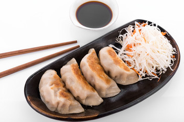 Japanese gyoza on white background