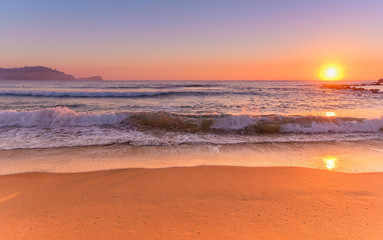 Fototapeta na wymiar Rocky Sunrise Seascape