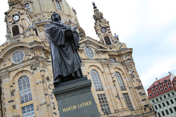 Fototapeta na wymiar Frauenkirche (Our Lady church) and statue Martin Luther in the center of old town in Dresden, Germany