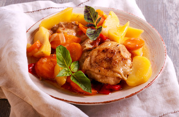 Chicken and vegetable stew on plate