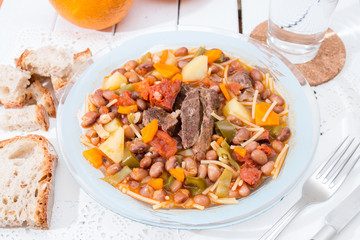 Brown beans with meat and carrot