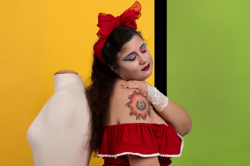 Pinup girl in pop art backdrop