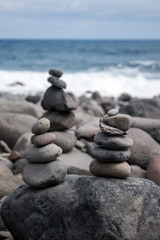 Fototapeta na wymiar Balanced stones on beach
