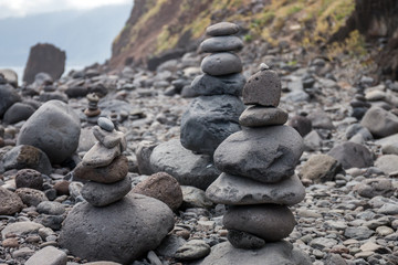 Fototapeta na wymiar Balanced stones on beach