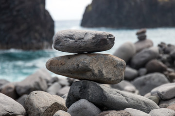 Balanced stones on beach