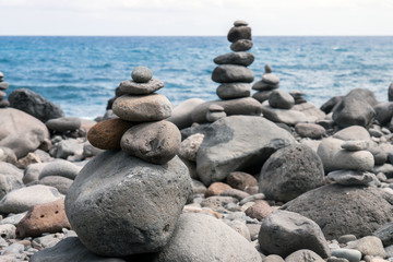 Balanced stones on beach