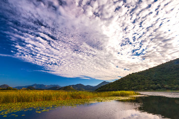 Incredibly beautiful clouds over the Skadar Lake. Montenegro.