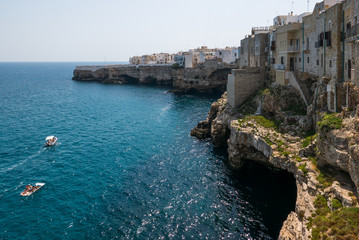 Fototapeta na wymiar Polignano a mare breathtaking sight, Puglia, Italy. Italian panorama. Cliffs on adriatic sea.