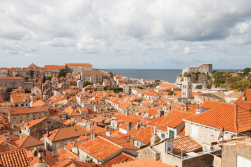 Fototapeta na wymiar old city of Dubrovnik. A view from above of the ancient houses and fortress Lovrijenac. Croatia