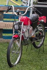 Fototapeta na wymiar Vintage motorcycle in the grass
