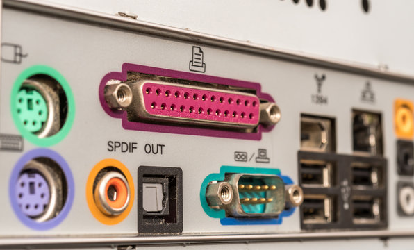 back of a computer motherboard, mouse, ubs, audio connectors, screen and keyboard, panel connector