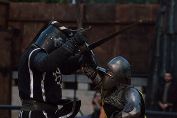 Fototapeta na wymiar Two medieval warriors on a intense fight.