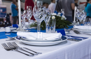 very nice set and decorated table in a restaurant without food