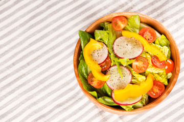 close up salad on cotton napkin background on top view