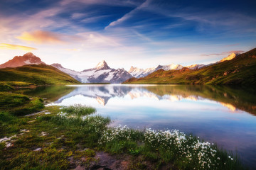 Fototapeta premium Great view of Mt. Schreckhorn and Wetterhorn above Bachalpsee lake. Location place Swiss alps, Grindelwald valley, Europe.
