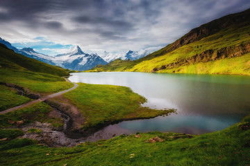 Panorama of Mt. Schreckhorn and Wetterhorn. Location place Bachalpsee in Swiss alps, Grindelwald, Europe.