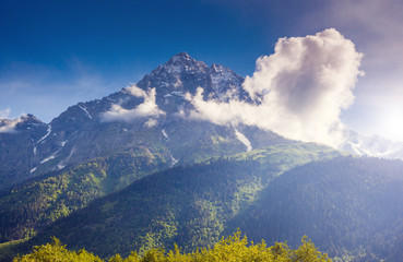 Fantastic snow peaks of Mt. Ushba in the morning light. Location place Svaneti, Mestia, Georgia, Europe. High Caucasus ridge.