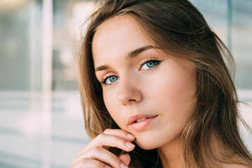 Obraz premium Close up portrait of a beautiful young woman
