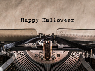 Happy Halloween printed on a vintage typewriter. old typewriter with text happy halloween