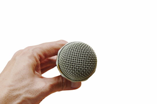hand holding microphone on white background