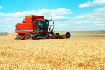 Plakat Modern agricultural equipment on field