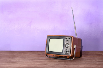 Obraz premium Retro TV on color background
