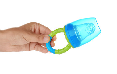 Woman holding baby's nibbler on white background