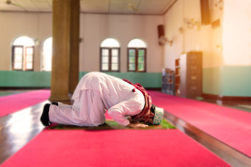 Islam muslim man praying in mosque