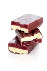 Broken chocolate bar with strawberry jelly fill