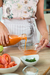 woman preparing a gazpacho