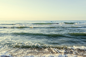 The Black Sea beach with golden sands, blue fresh clear water, bulgarian shore