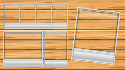 Different shapes of picture frames on wooden board