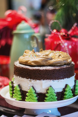 Delicious chocolate cake decorated with marzipan Christmas trees at the food festival in Utrecht in the Netherlands